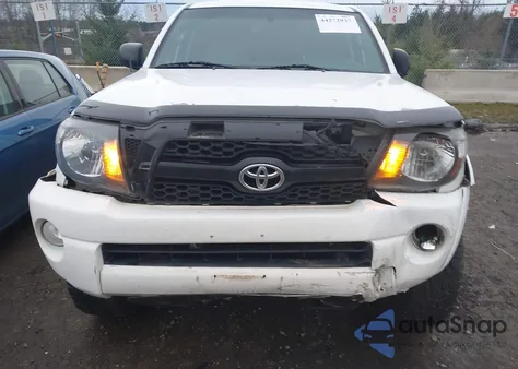 2009 Toyota Tacoma Base V6 z USA, uszkodzony, nr VIN 5TEUU42NX9Z595880